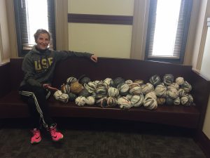 student with plarn balls