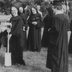 nun breaking ground smiling