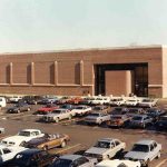 recreation center with parking lot full of cars