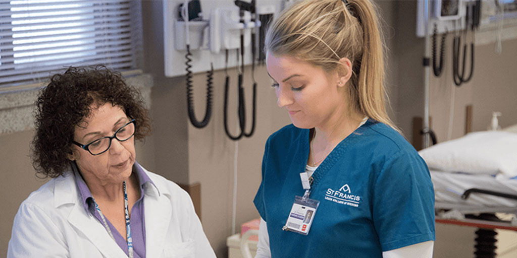 female nurse with usf faculty