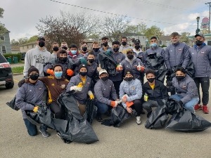 group of students picking up trash