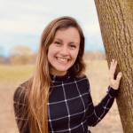 faith reed outside by a tree